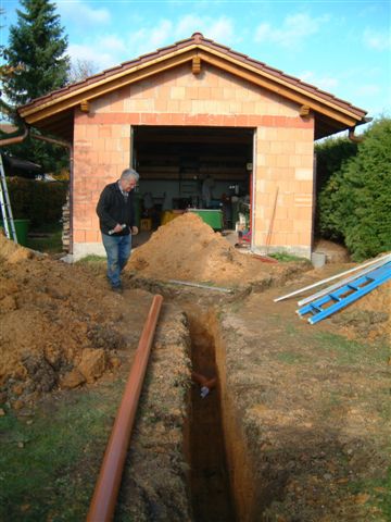 Graben Sickerschacht KG Rohr verlegen
